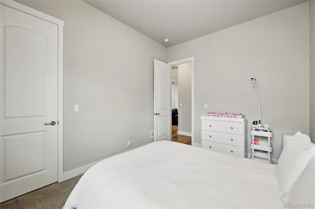 18212 W 95th Pl, Arvada, CO 80007 - carpeted bedroom featuring baseboards