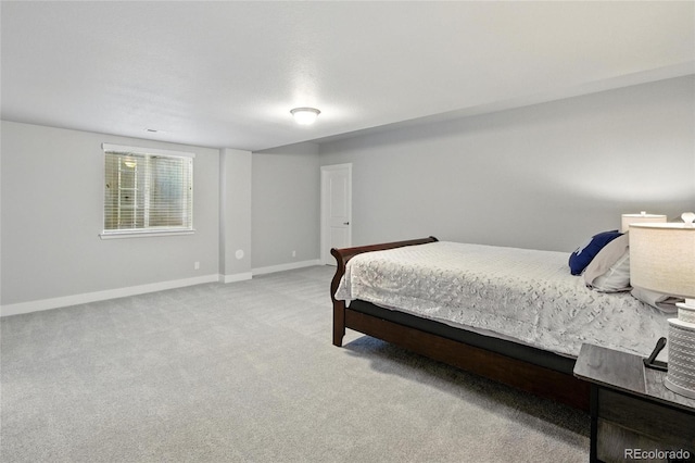 18212 W 95th Pl, Arvada, CO 80007 - bedroom with baseboards and light colored carpet