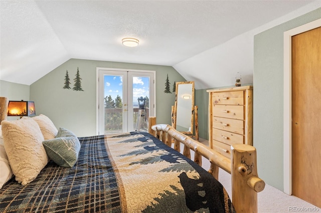 bedroom featuring access to exterior, carpet, lofted ceiling, and a textured ceiling