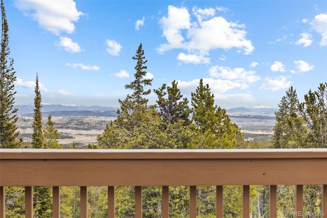 balcony featuring a mountain view