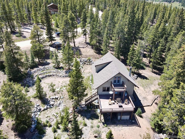 bird's eye view with a forest view