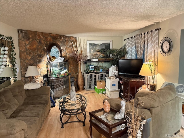 9410 W 89th Cir, Broomfield, CO 80021 - living area with wood finished floors and a textured ceiling