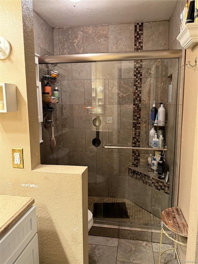 9410 W 89th Cir, Broomfield, CO 80021 - full bath with vanity, a shower stall, and a textured wall