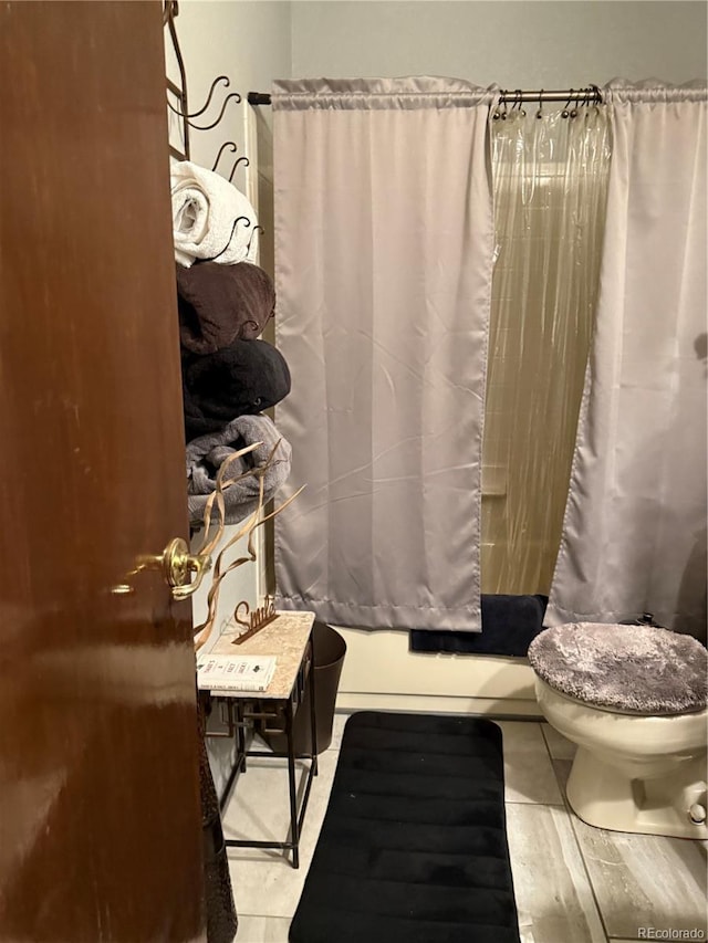 9410 W 89th Cir, Broomfield, CO 80021 - full bath with toilet and shower / bathtub combination with curtain