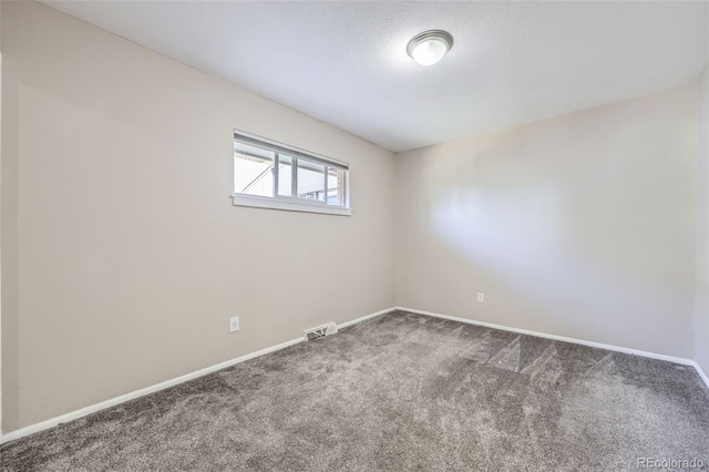 951 Tennyson St, Denver, CO 80204 - carpeted spare room with baseboards and visible vents