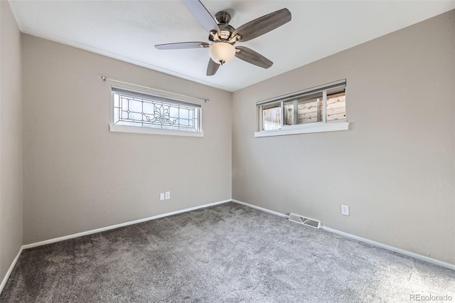 951 Tennyson St, Denver, CO 80204 - spare room featuring a ceiling fan, carpet floors, baseboards, and visible vents