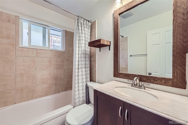 951 Tennyson St, Denver, CO 80204 - full bath featuring toilet, shower / tub combo, visible vents, and vanity