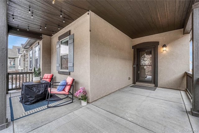 692 Sage Forest Ln, Monument, CO 80132 - doorway to property featuring stucco siding