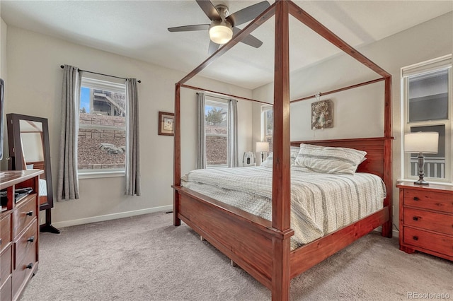 692 Sage Forest Ln, Monument, CO 80132 - bedroom featuring light carpet, ceiling fan, and baseboards