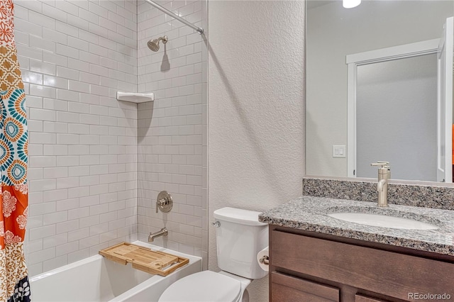 692 Sage Forest Ln, Monument, CO 80132 - bathroom with vanity, shower / bath combination with curtain, toilet, and a textured wall