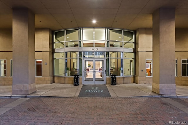 view of exterior entry featuring french doors