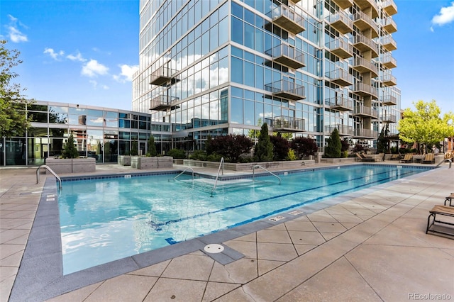 community pool with a patio