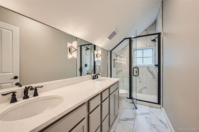 bathroom featuring toilet, an enclosed shower, vaulted ceiling, and vanity