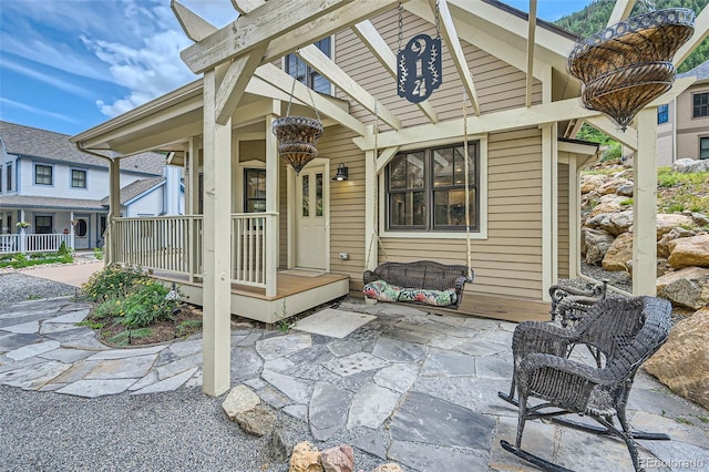 back of house with covered porch