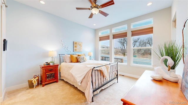 bedroom with recessed lighting, baseboards, light carpet, and ceiling fan