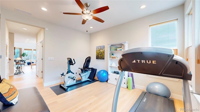 exercise area with visible vents, ceiling fan, baseboards, recessed lighting, and wood finished floors