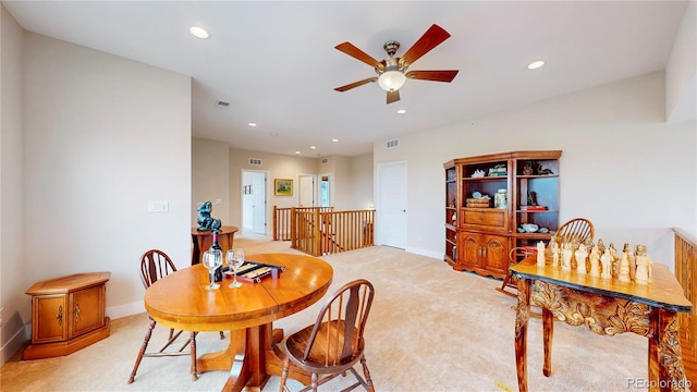 dining space with recessed lighting, visible vents, light carpet, and baseboards