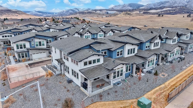 aerial view featuring a residential view and a mountain view