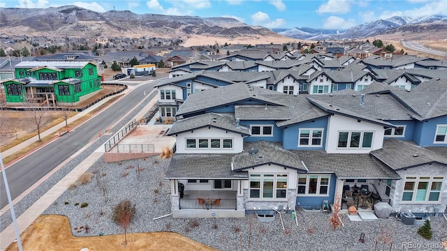 aerial view with a residential view and a mountain view