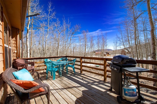 wooden deck with area for grilling