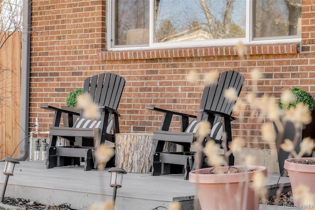 exterior space featuring brick siding