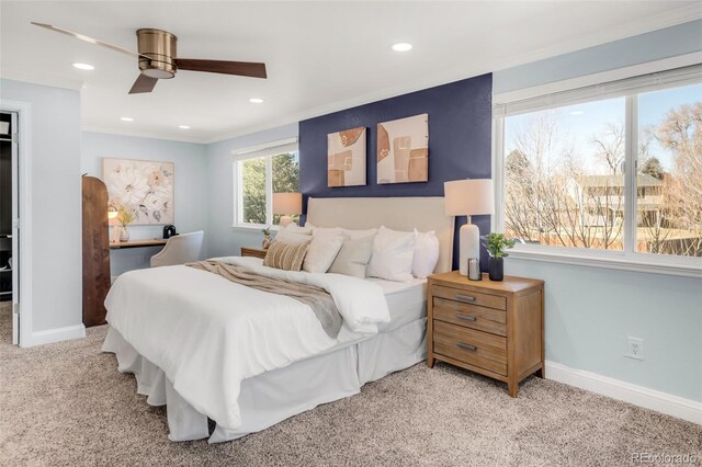 bedroom featuring light carpet, baseboards, crown molding, and recessed lighting