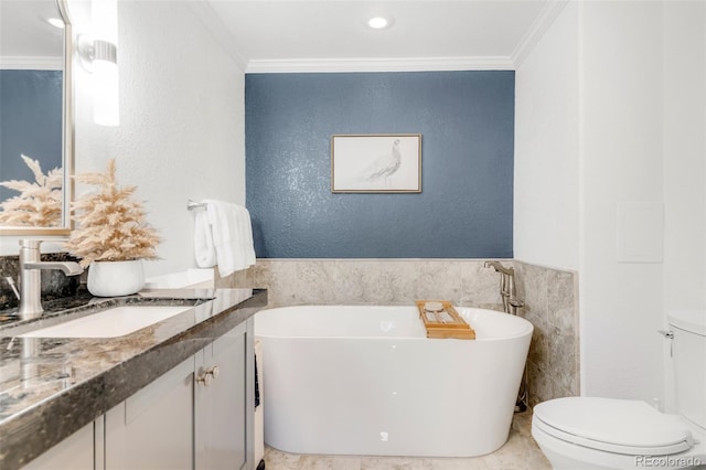 bathroom with toilet, a freestanding tub, and crown molding