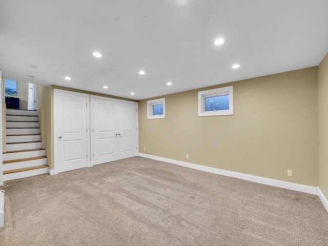 basement with light colored carpet