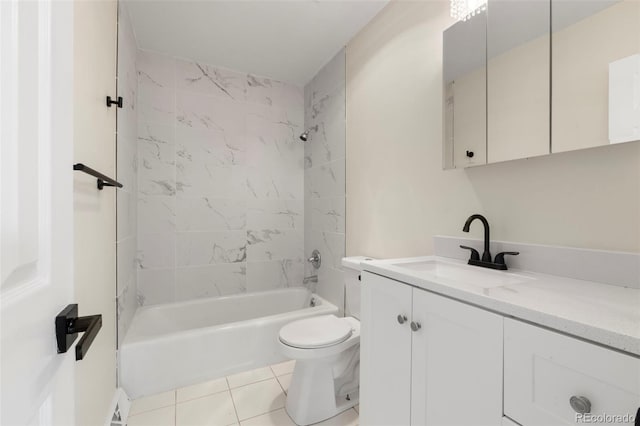 308 Oswego St, Aurora, CO 80010 - full bath featuring vanity, toilet, shower / washtub combination, and tile patterned flooring