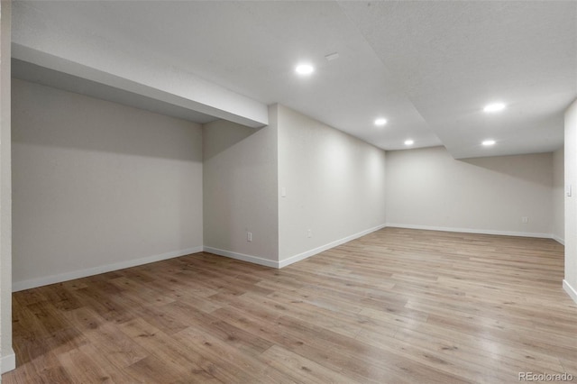 308 Oswego St, Aurora, CO 80010 - finished basement with recessed lighting, baseboards, and light wood-style flooring