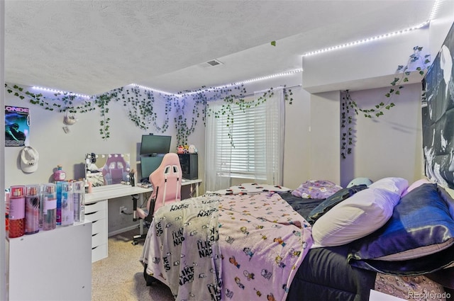carpeted bedroom featuring a textured ceiling