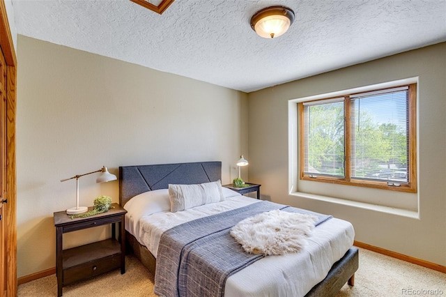2613 Fox Run Ct, Fort Collins, CO 80526 - bedroom with light colored carpet, baseboards, and a textured ceiling
