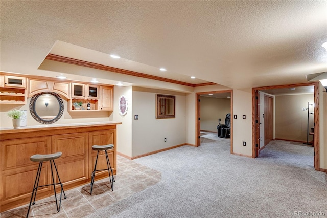 2613 Fox Run Ct, Fort Collins, CO 80526 - indoor bar featuring light colored carpet, a textured ceiling, baseboards, crown molding, and recessed lighting