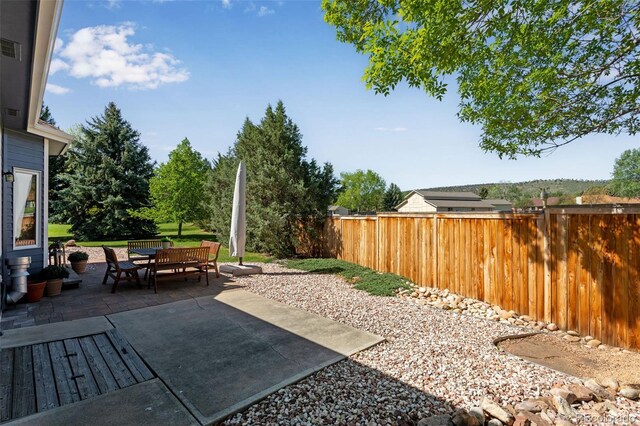 2613 Fox Run Ct, Fort Collins, CO 80526 - fenced backyard with a patio
