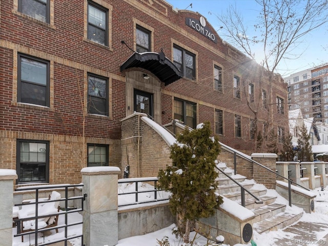 view of snow covered property