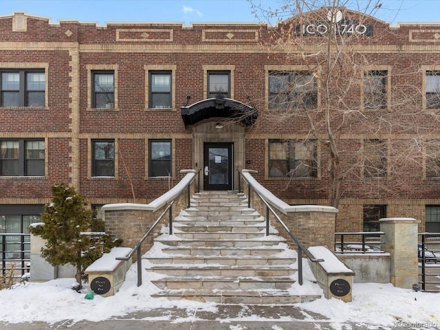 view of snow covered property