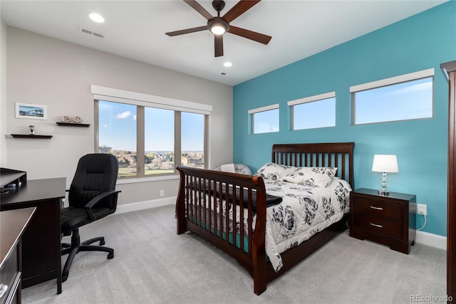bedroom with light colored carpet, baseboards, a desk, recessed lighting, and ceiling fan