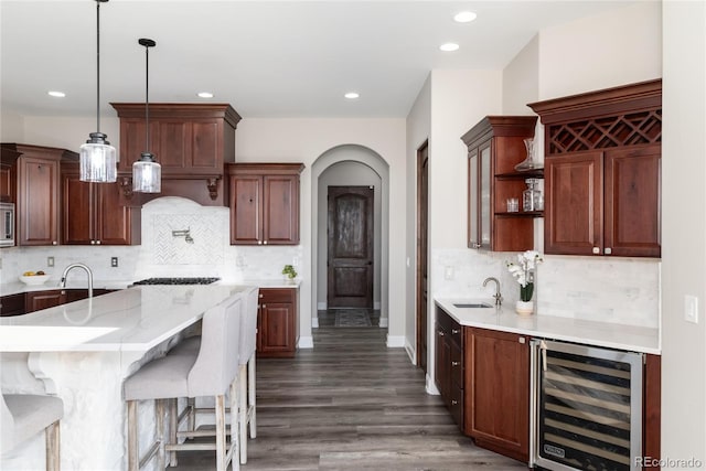 5409 Sedona Dr, Parker, CO 80134 - kitchen featuring wine cooler, a sink, open shelves, recessed lighting, and dark wood-type flooring