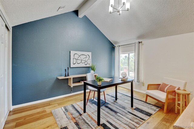 11358 W 85th Pl Unit E, Arvada, CO 80005 - home office with wood finished floors, a textured ceiling, and baseboards