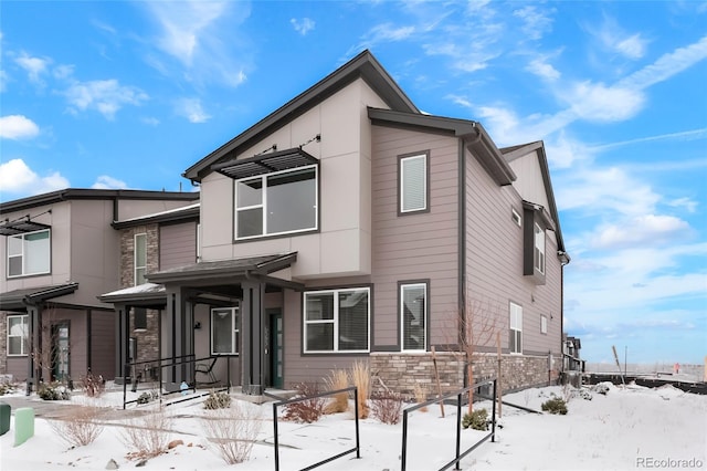 view of front of property with stone siding