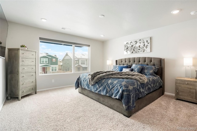 bedroom featuring carpet, visible vents, baseboards, and recessed lighting