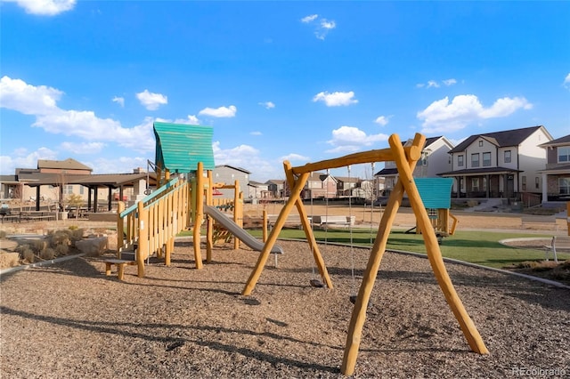 community jungle gym featuring a residential view
