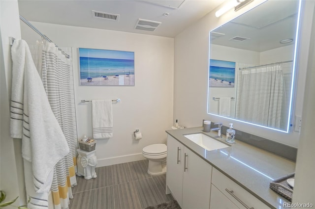 full bath with toilet, baseboards, visible vents, and vanity