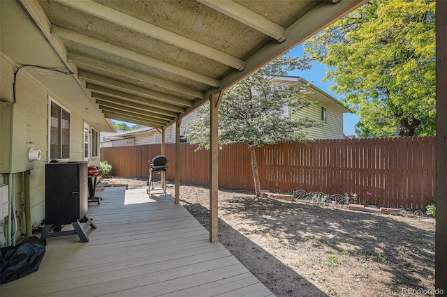 1641 Biscay Cir, Aurora, CO 80011 - wooden terrace with a fenced backyard