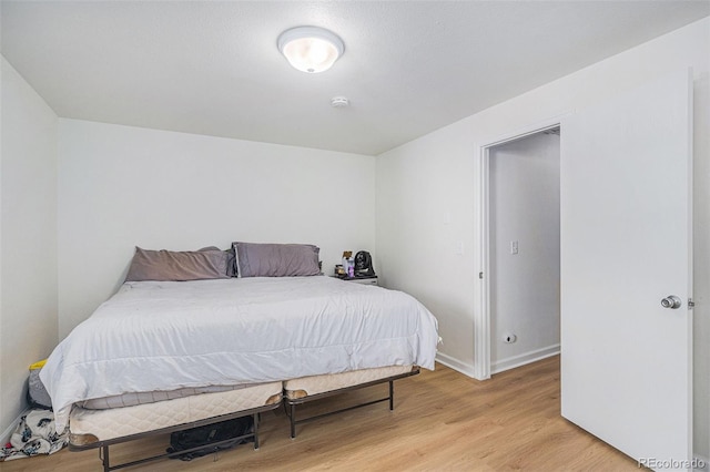 1641 Biscay Cir, Aurora, CO 80011 - bedroom with light wood finished floors and baseboards