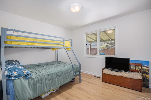 1641 Biscay Cir, Aurora, CO 80011 - bedroom featuring wood finished floors and baseboards