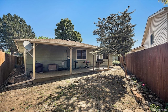 1641 Biscay Cir, Aurora, CO 80011 - rear view of property with a fenced backyard and a deck