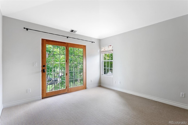2411 S Milwaukee St, Denver, CO 80210 - carpeted empty room featuring baseboards