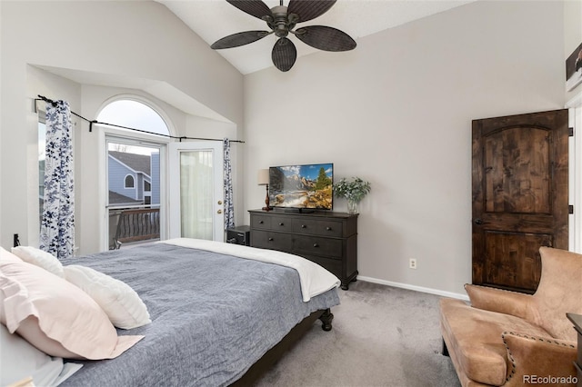 carpeted bedroom with access to exterior, a ceiling fan, baseboards, and vaulted ceiling