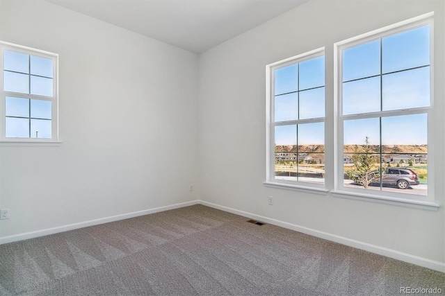 view of carpeted spare room